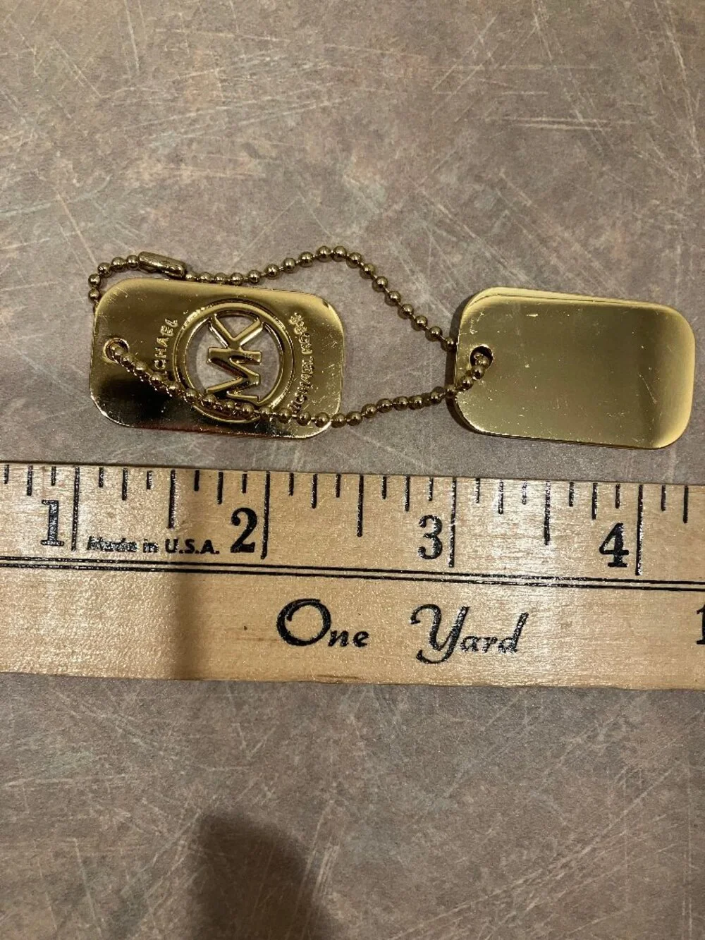 Gold Michael Kors Metal Bag Tag